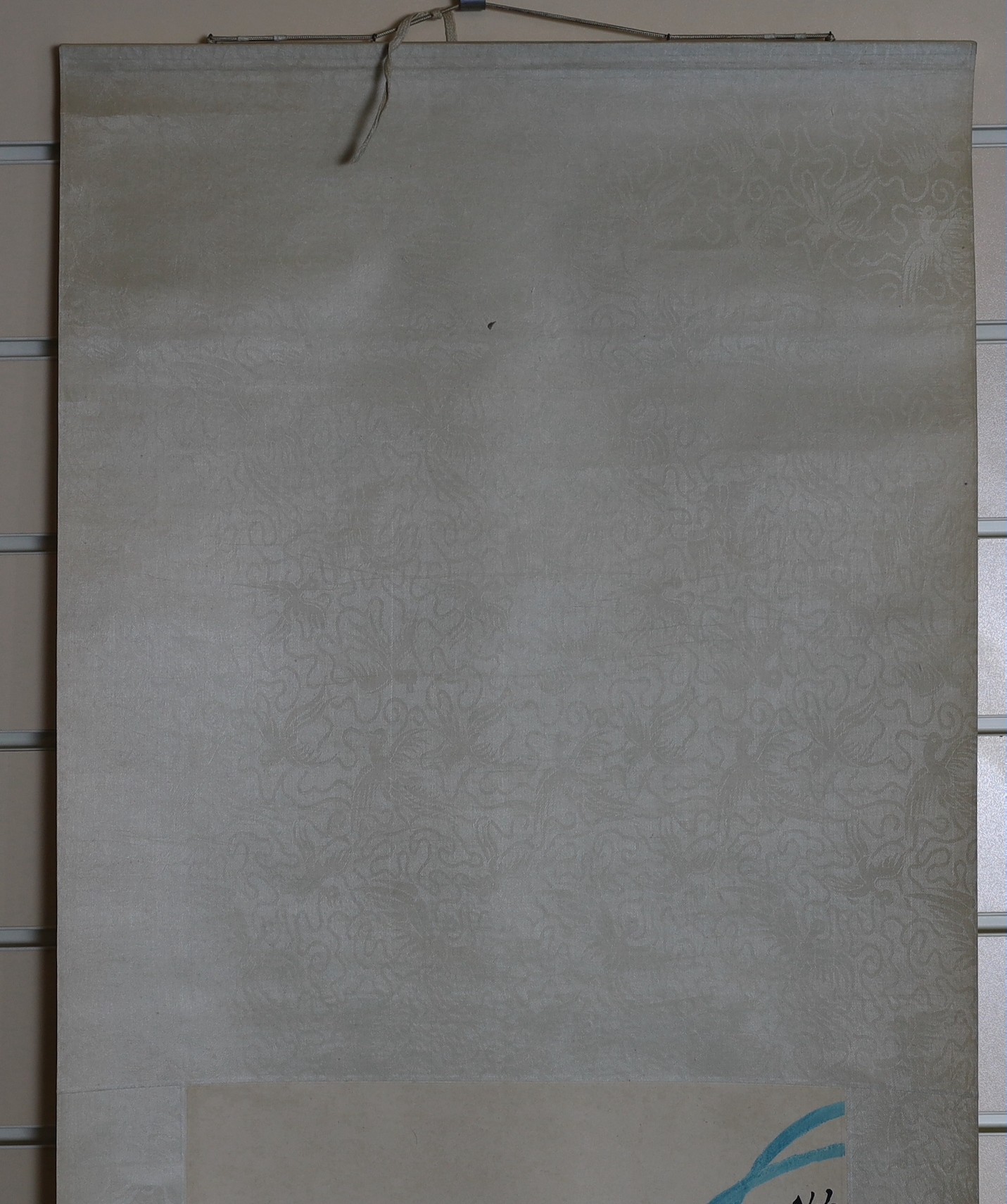 After Qi Baishi (1863-1957), Ribbon peonies, printed scroll, published by Tianjin Arts & Crafts Export Company, 1959, image 104cm x 33cm